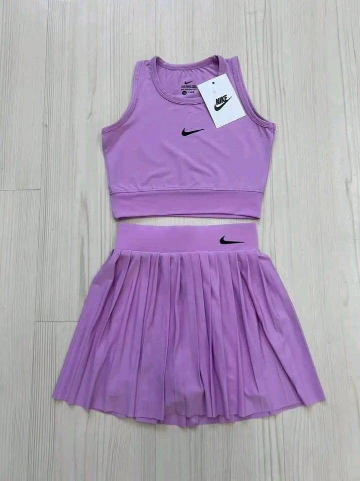 Dri-FIT women's cropped top and a pleated tennis skirt