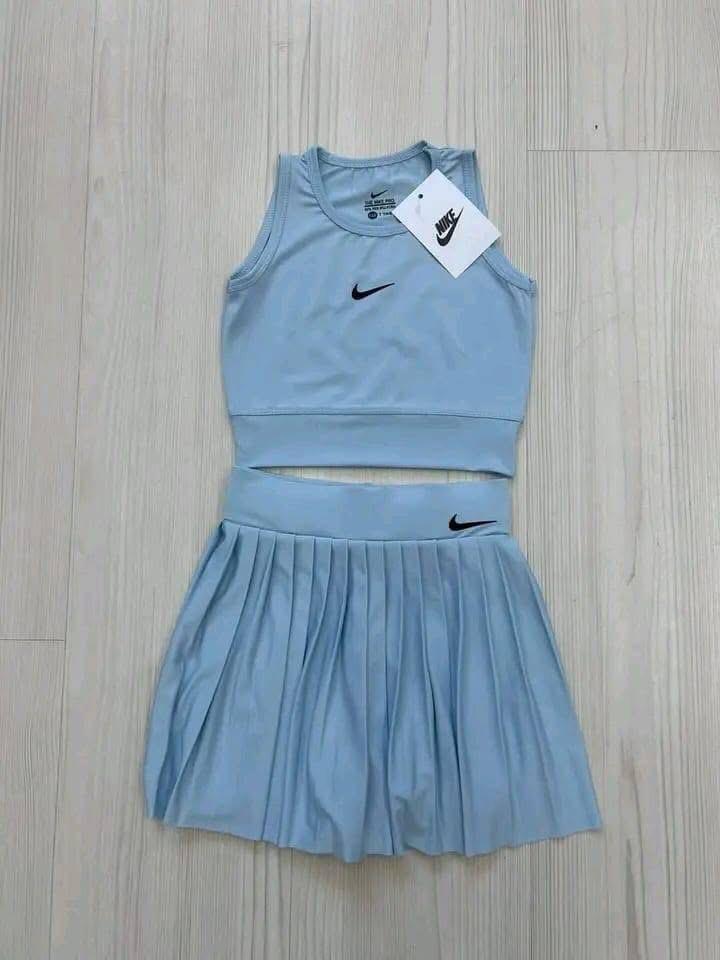 Dri-FIT women's cropped top and a pleated tennis skirt