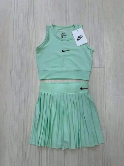 Dri-FIT women's cropped top and a pleated tennis skirt