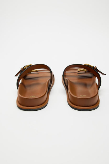 The buckled sandals